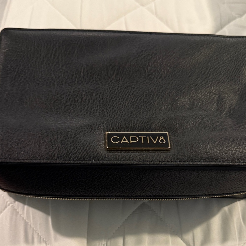 Black zippered custom Toiletry Bag with organizational compartments